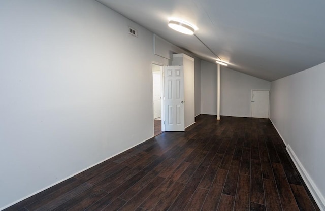 basement featuring dark hardwood / wood-style floors