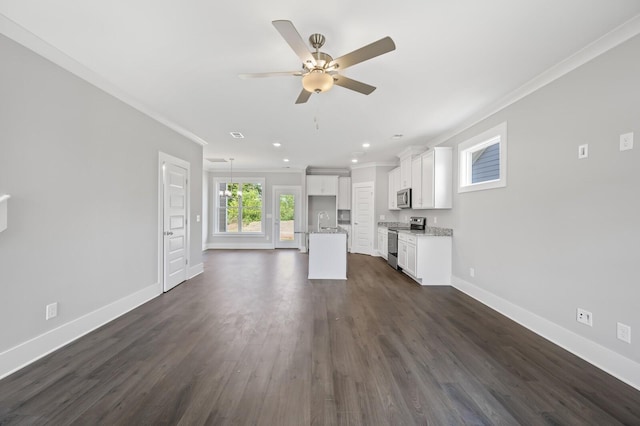 unfurnished living room featuring crown molding, ceiling fan, dark hardwood / wood-style flooring, and sink