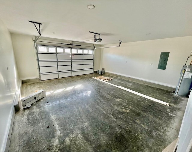 garage with a garage door opener, electric panel, and electric water heater