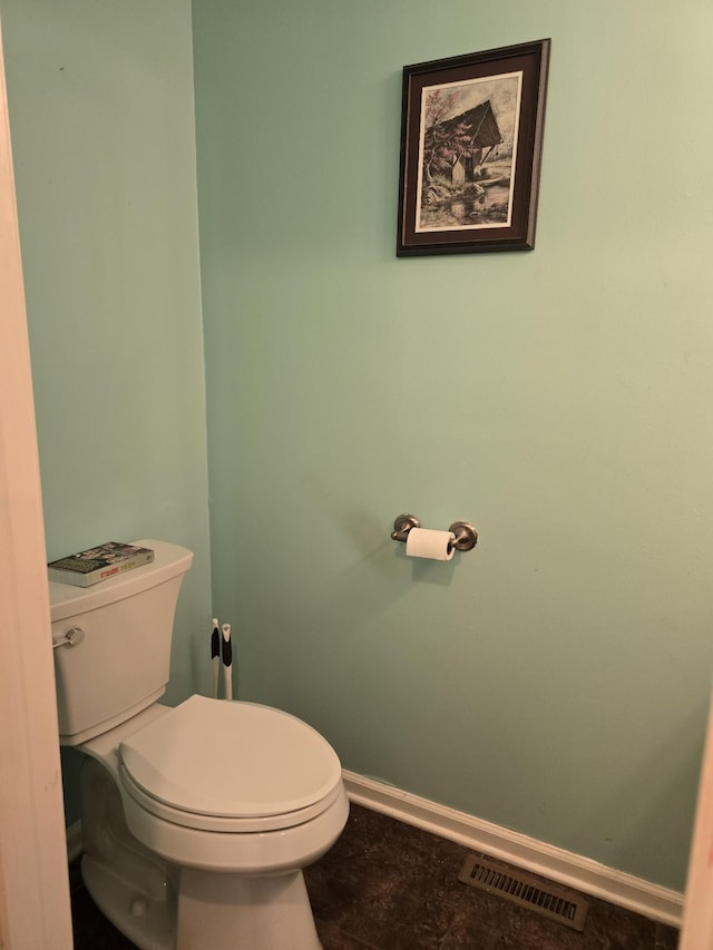 bathroom featuring toilet