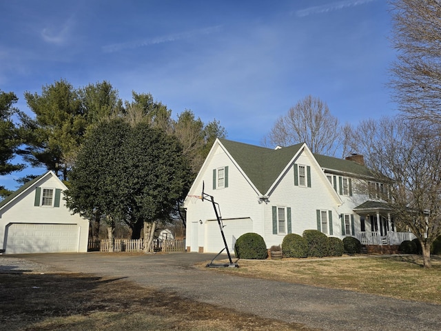 view of property exterior with a garage