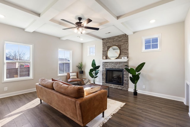 living room featuring dark hardwood / wood-style floors, coffered ceiling, and beamed ceiling