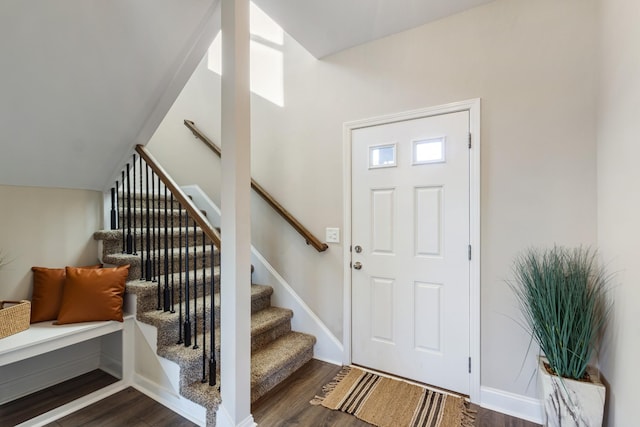 entrance foyer with dark hardwood / wood-style flooring