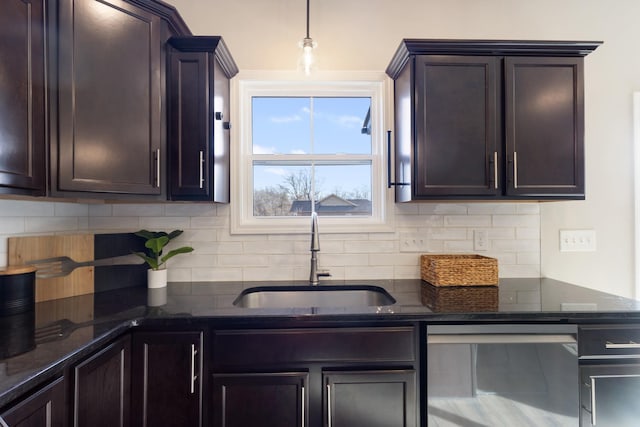 kitchen with pendant lighting, sink, dishwasher, dark brown cabinets, and decorative backsplash