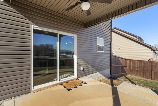 view of patio featuring ceiling fan