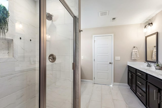 bathroom with vanity and walk in shower