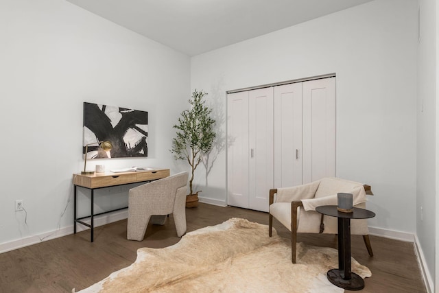 office with dark wood-type flooring