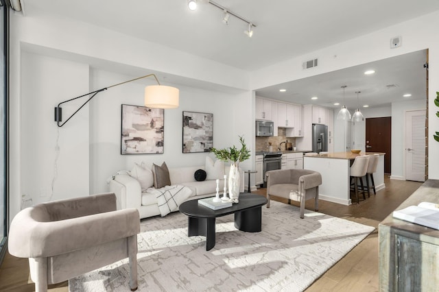 living room with light wood-type flooring