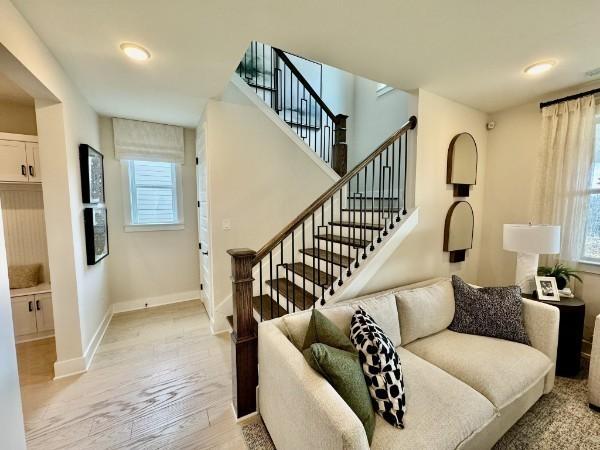 living room with light hardwood / wood-style floors