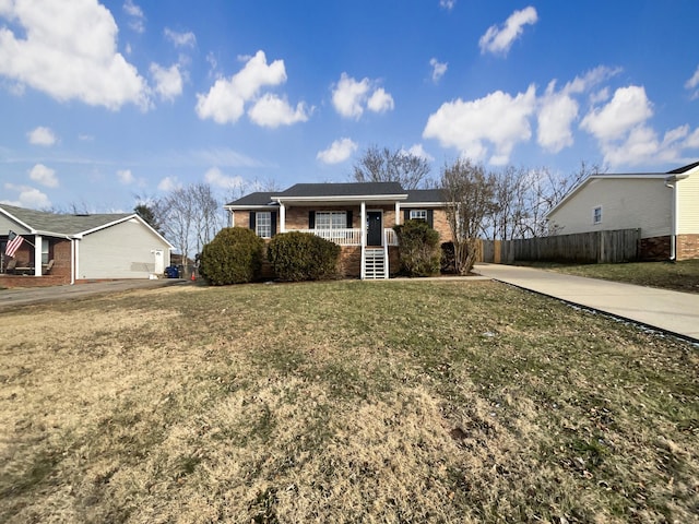 view of front of property with a porch and a front yard