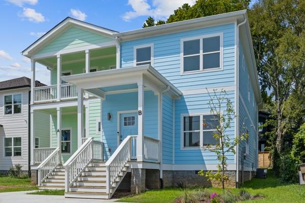 view of front of home with a porch and a balcony