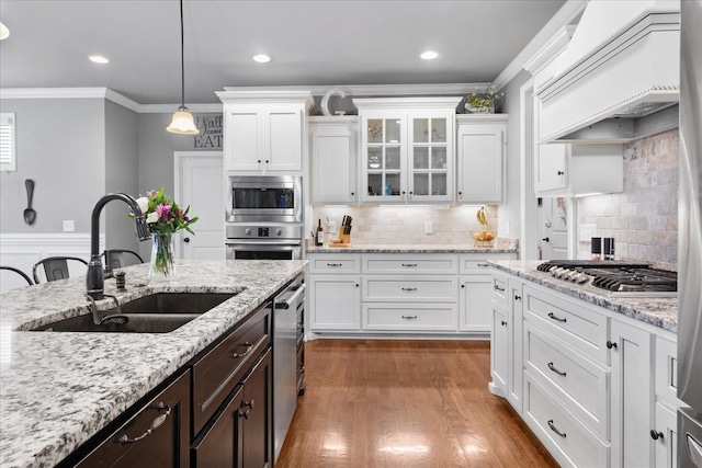 kitchen with white cabinetry, sink, and appliances with stainless steel finishes