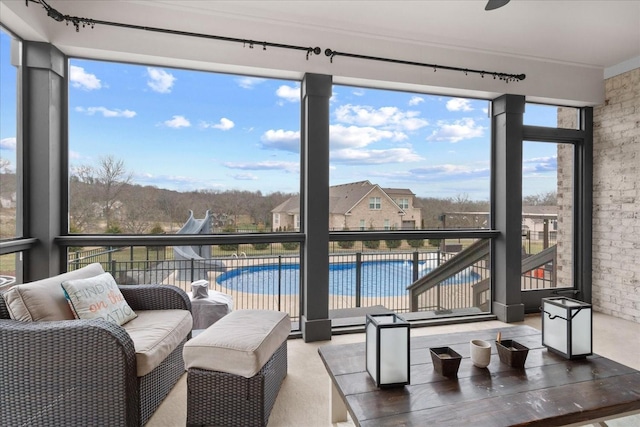 sunroom featuring a wealth of natural light