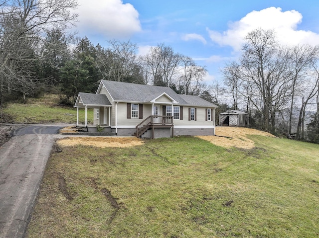 view of front of home featuring a front lawn and a porch