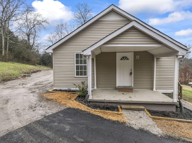 bungalow-style home with a porch