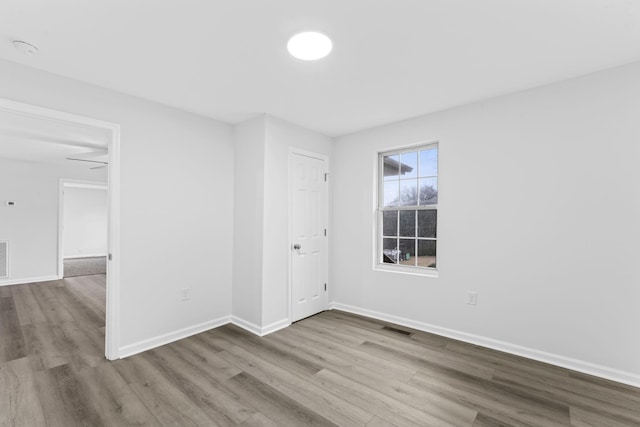 empty room featuring light hardwood / wood-style floors