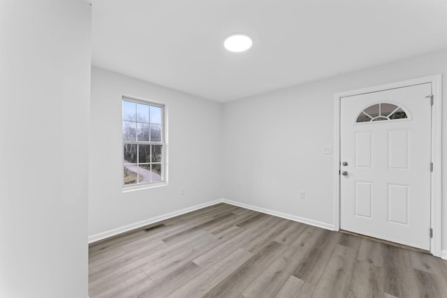 entrance foyer with light hardwood / wood-style floors