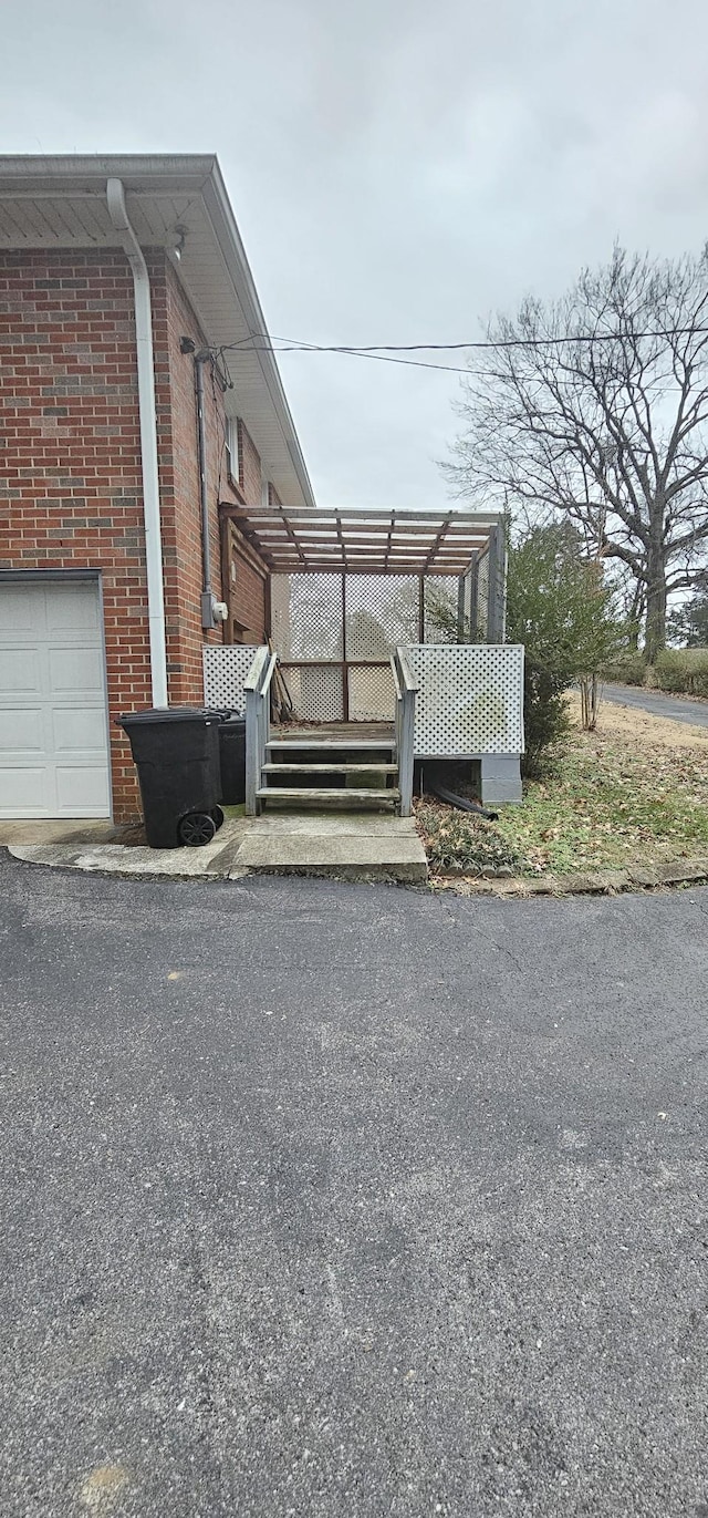 view of side of property featuring a garage