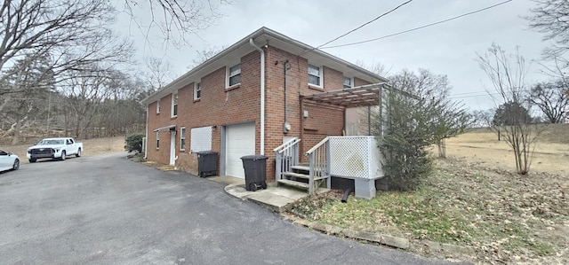 view of property exterior featuring a garage