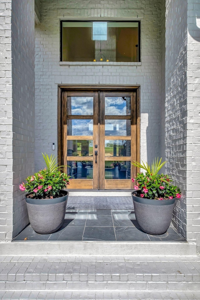 doorway to property with french doors