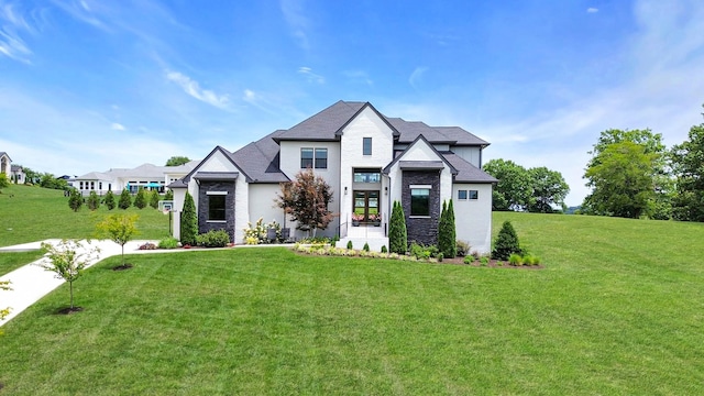 view of front of home with a front lawn