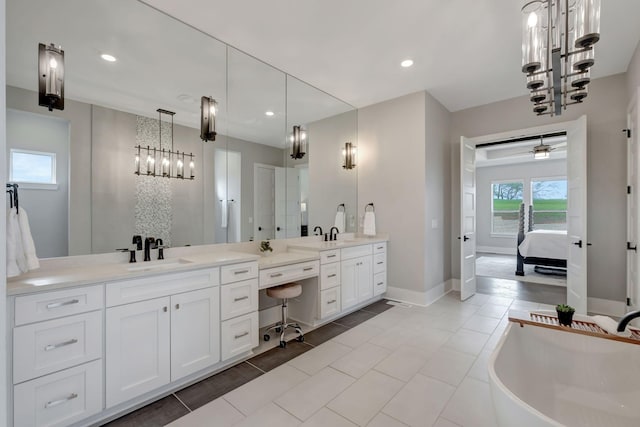 bathroom with vanity, tile patterned floors, and ceiling fan