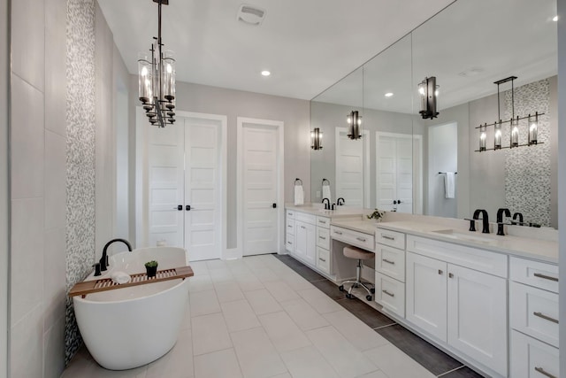 bathroom featuring vanity and a washtub