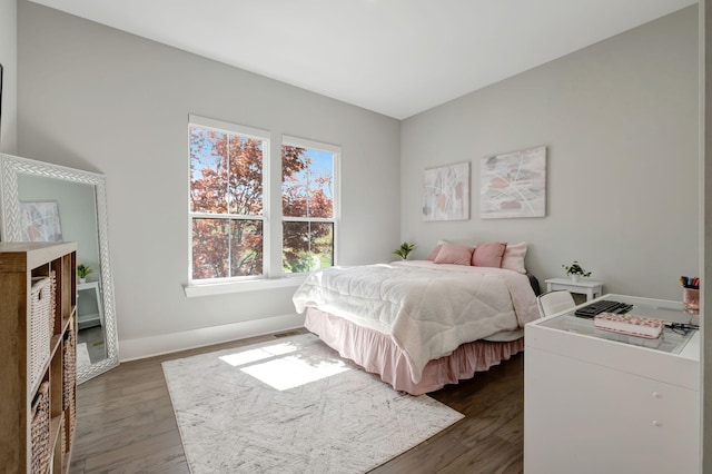 bedroom featuring dark wood-type flooring