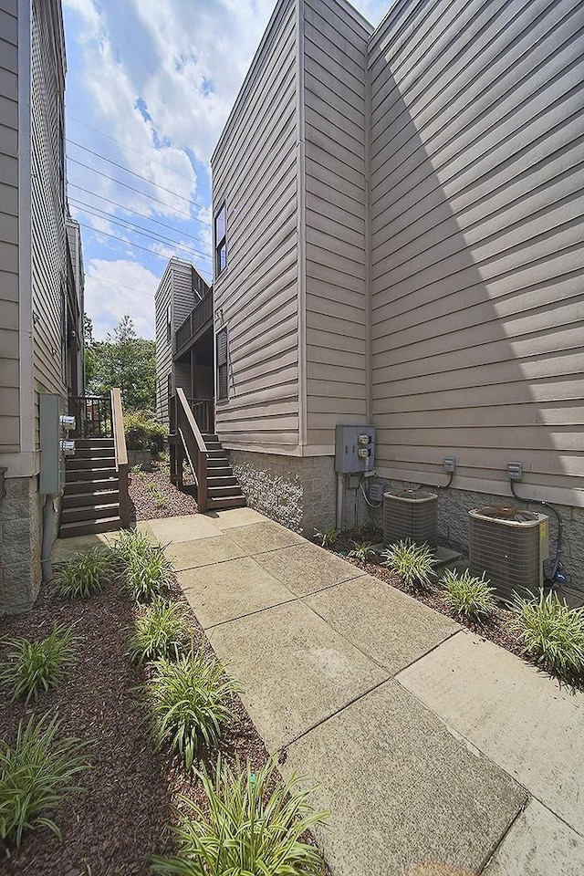 view of property exterior with central air condition unit