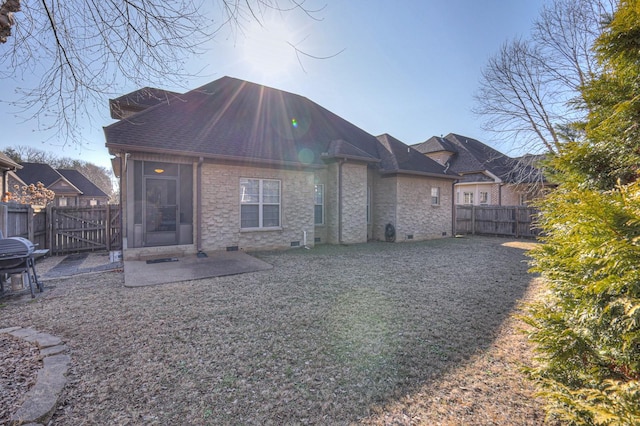 rear view of house featuring a patio