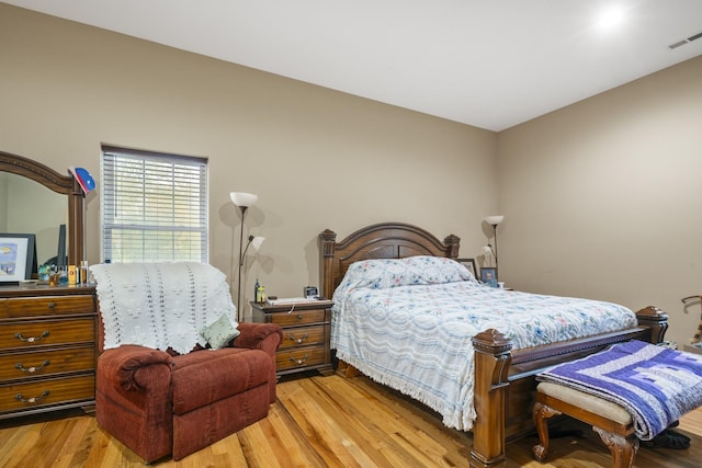 bedroom featuring light wood-type flooring