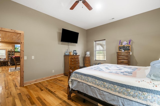 bedroom featuring wood-type flooring and ceiling fan