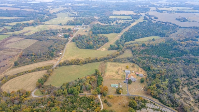 birds eye view of property featuring a rural view