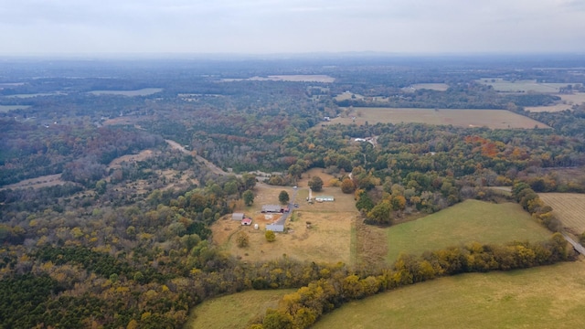 birds eye view of property with a rural view