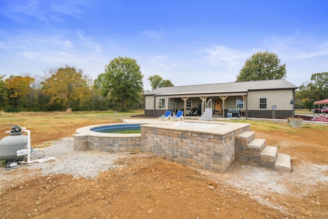 view of pool featuring a patio