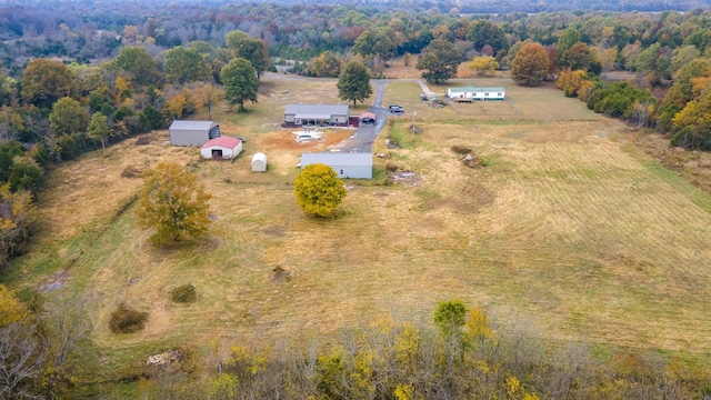 birds eye view of property featuring a rural view