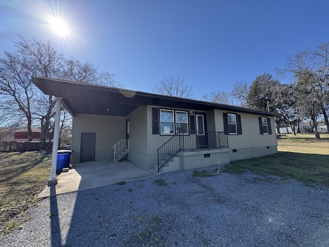 view of front of house with a carport