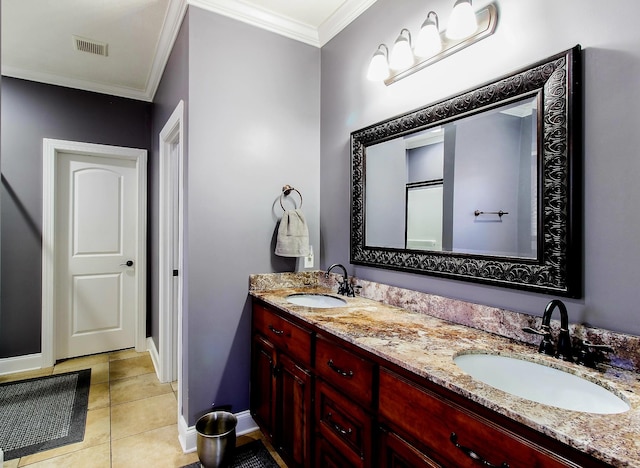 bathroom with tile patterned floors, ornamental molding, and vanity