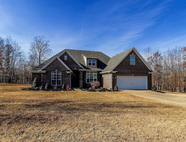 view of front facade featuring a garage and a front lawn