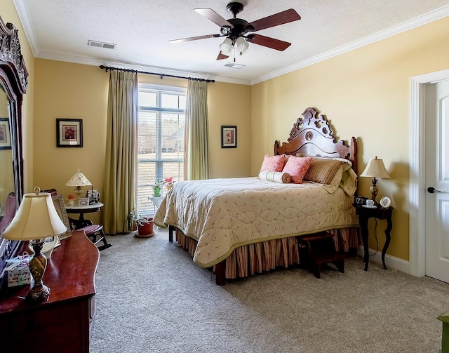 bedroom with crown molding, a textured ceiling, ceiling fan, and carpet flooring