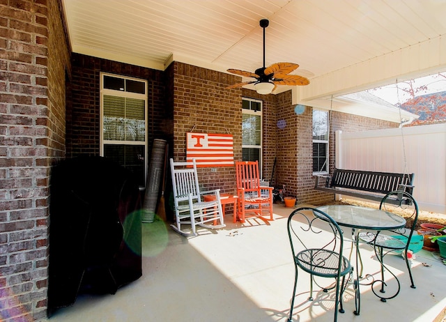 view of patio with grilling area and ceiling fan