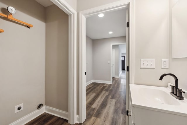 bathroom featuring vanity and hardwood / wood-style floors