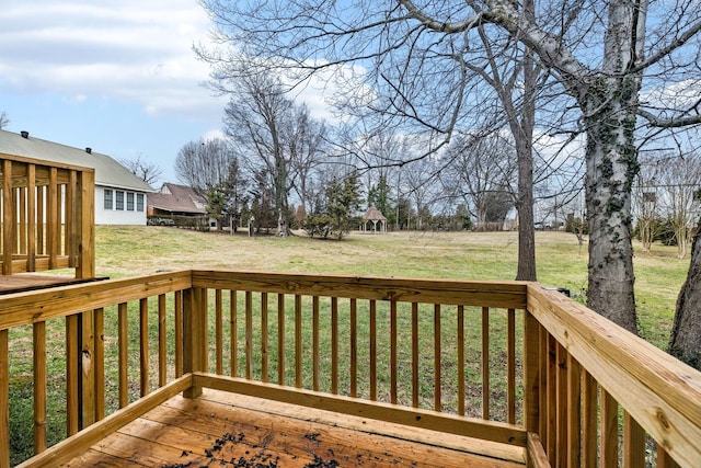 wooden deck with a yard