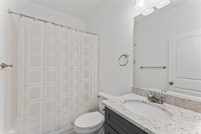 full bathroom featuring vanity, shower / bath combination with curtain, and toilet