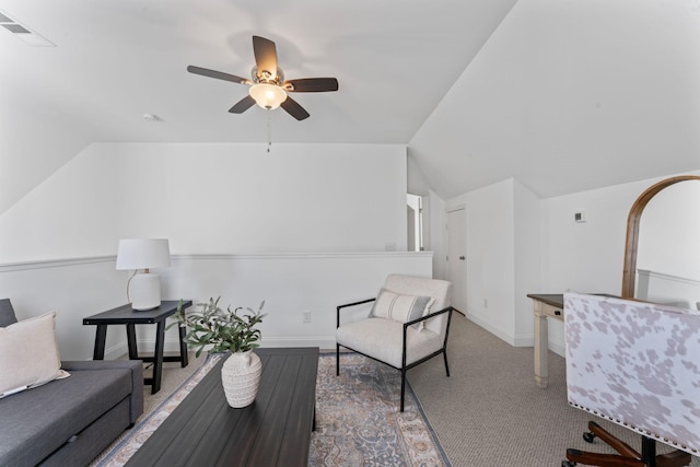 living area with lofted ceiling and ceiling fan