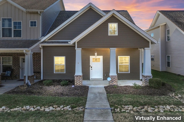 craftsman-style home featuring covered porch