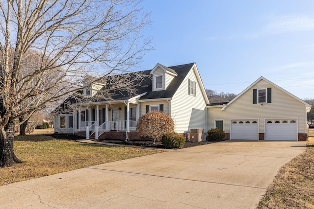 cape cod-style house with central AC unit, a front yard, and a porch