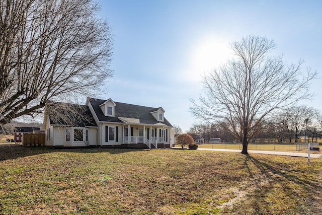 view of front of home with a front lawn and a porch