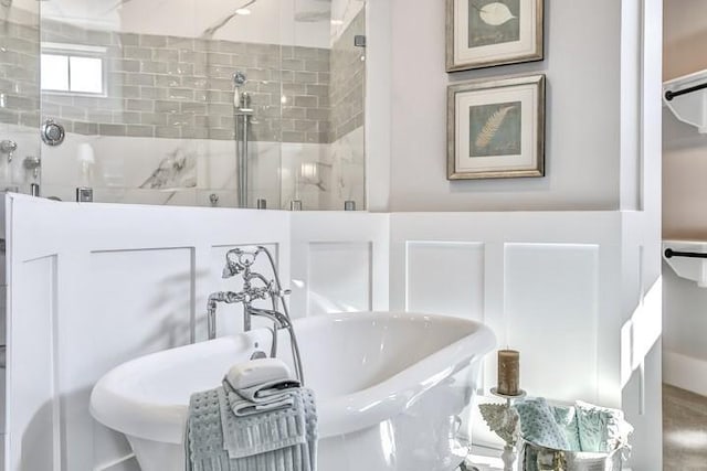 bathroom with a tile shower