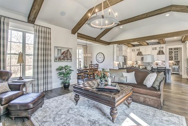 living room featuring an inviting chandelier, dark hardwood / wood-style floors, and lofted ceiling with beams